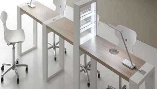 Why choose a manicure table with integrated LED lamp and vacuum cleaner?